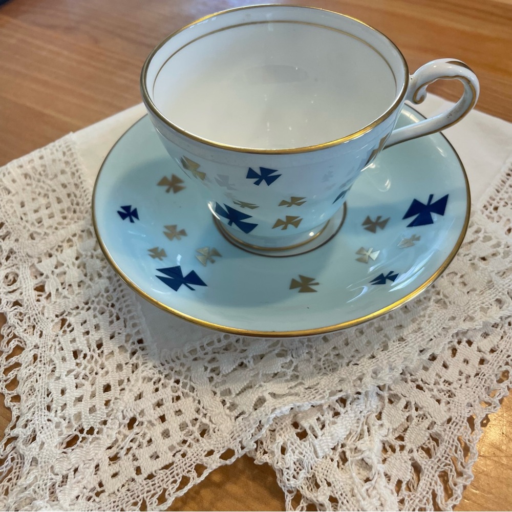 Aynsley Elegant Blue and Gold Teacup and Saucer Set, girl guide inspired design